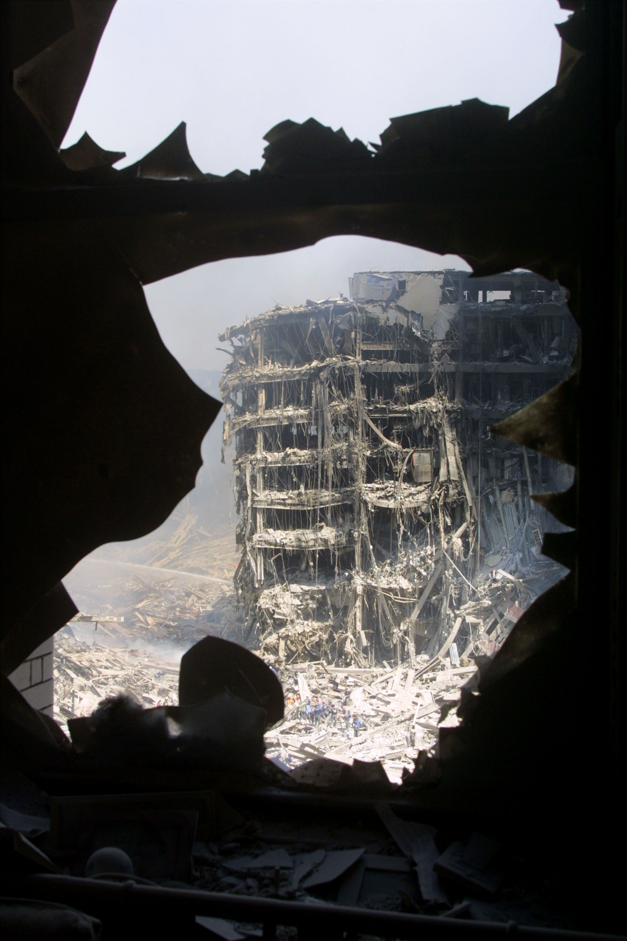 Rescue Workers Search Through WTC Rubble. Credit Mario Tama, courtesy of Getty Images