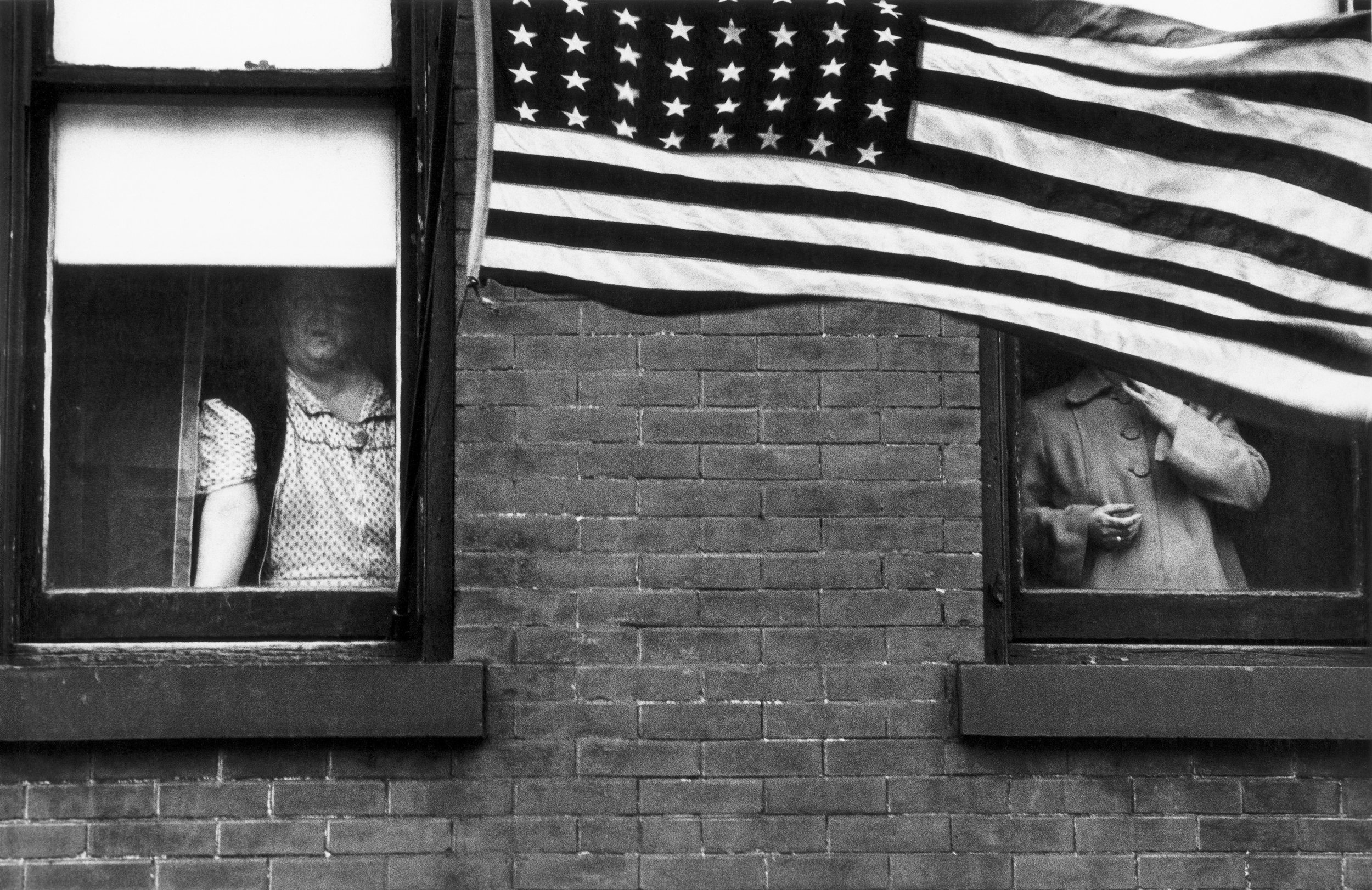 Parade – Hoboken, New Jersey, 1955 © Robert Frank from The Americans, courtesy Pace/MacGill