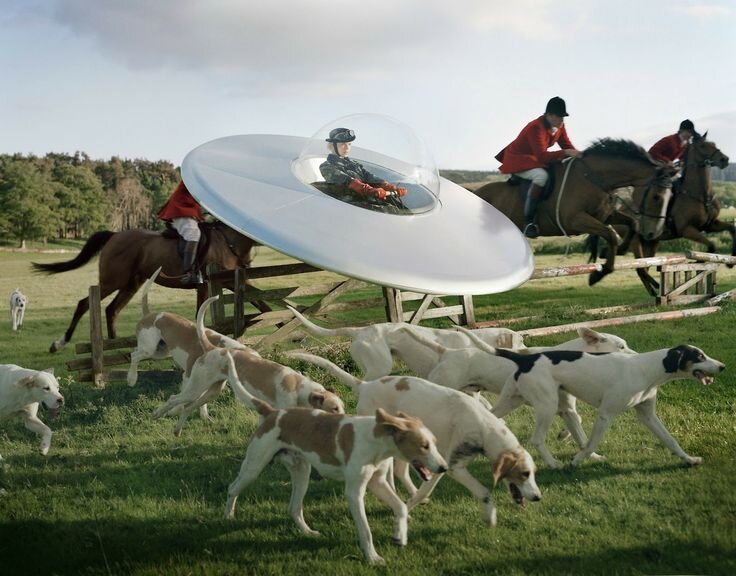   'Kinga Razjak in a flying saucer with members of the West Percy hunt'&nbsp; 2009 © Tim Walker 