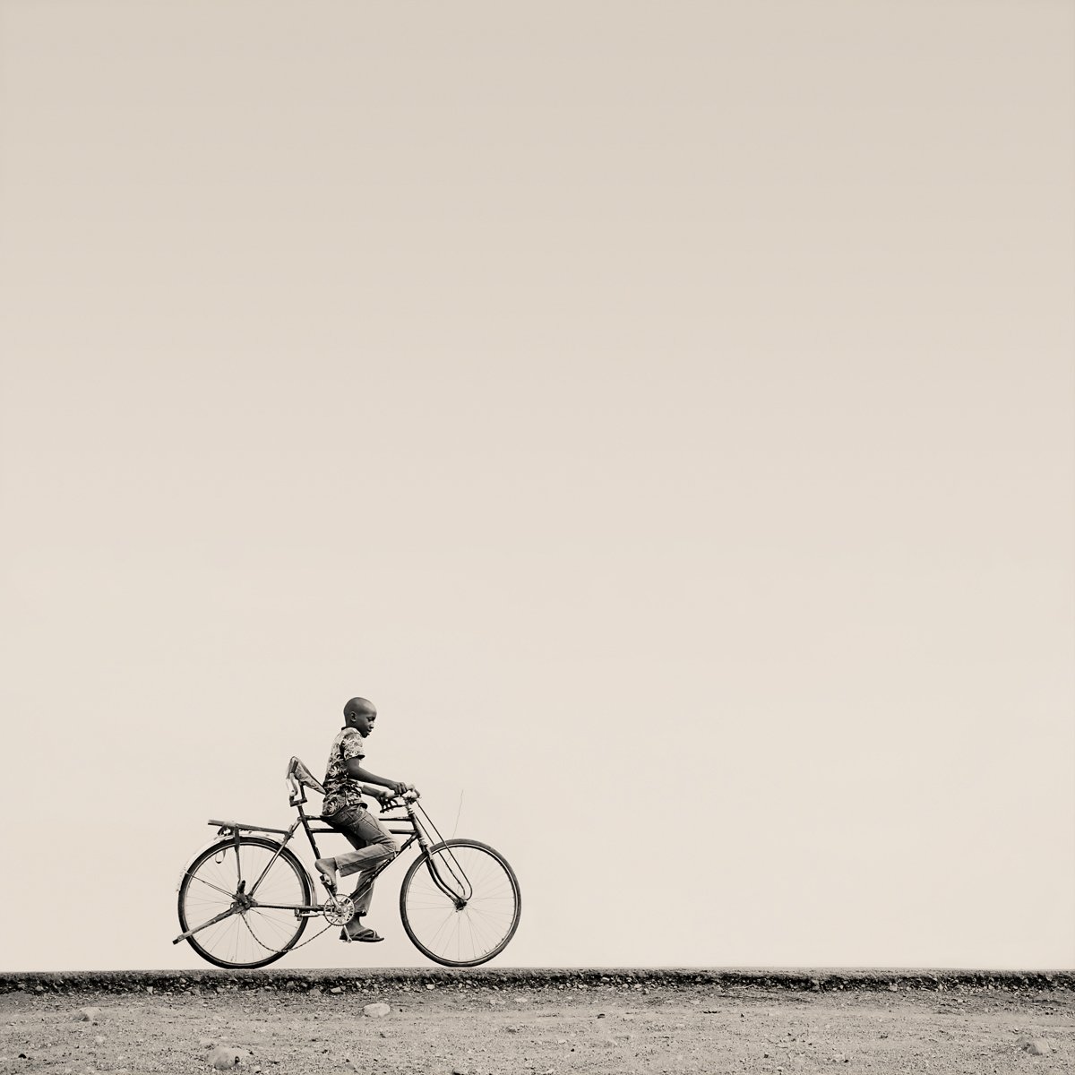  ⒸMarti Corn, Boy on a Bicycle