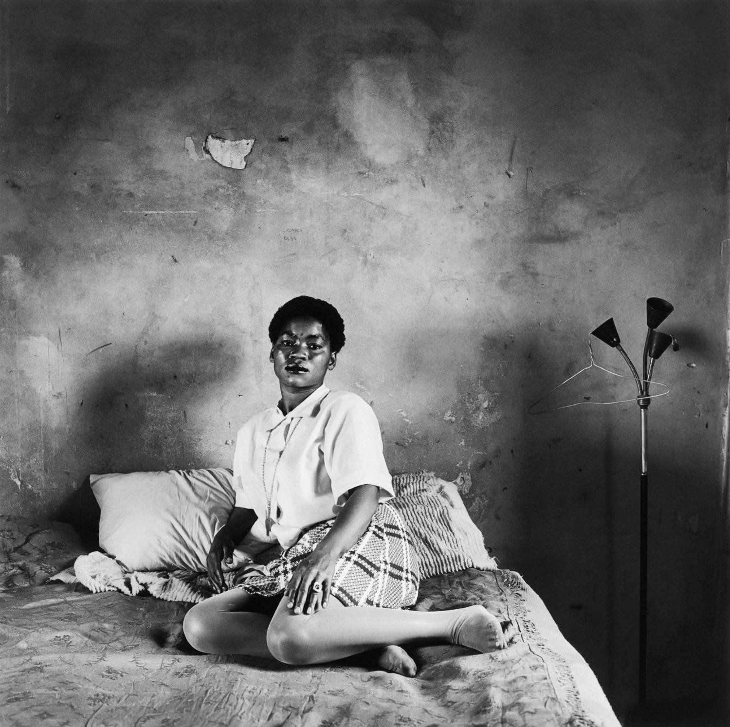  David Goldblatt,  Mrs. Miriam Diale in her bedroom, 5357 Orlando East, Soweto, Johannesburg,  18 October 1972, 1972printed. Courtesy of the Pilara Family Foundation Collection and Sotheby’s.&nbsp; 