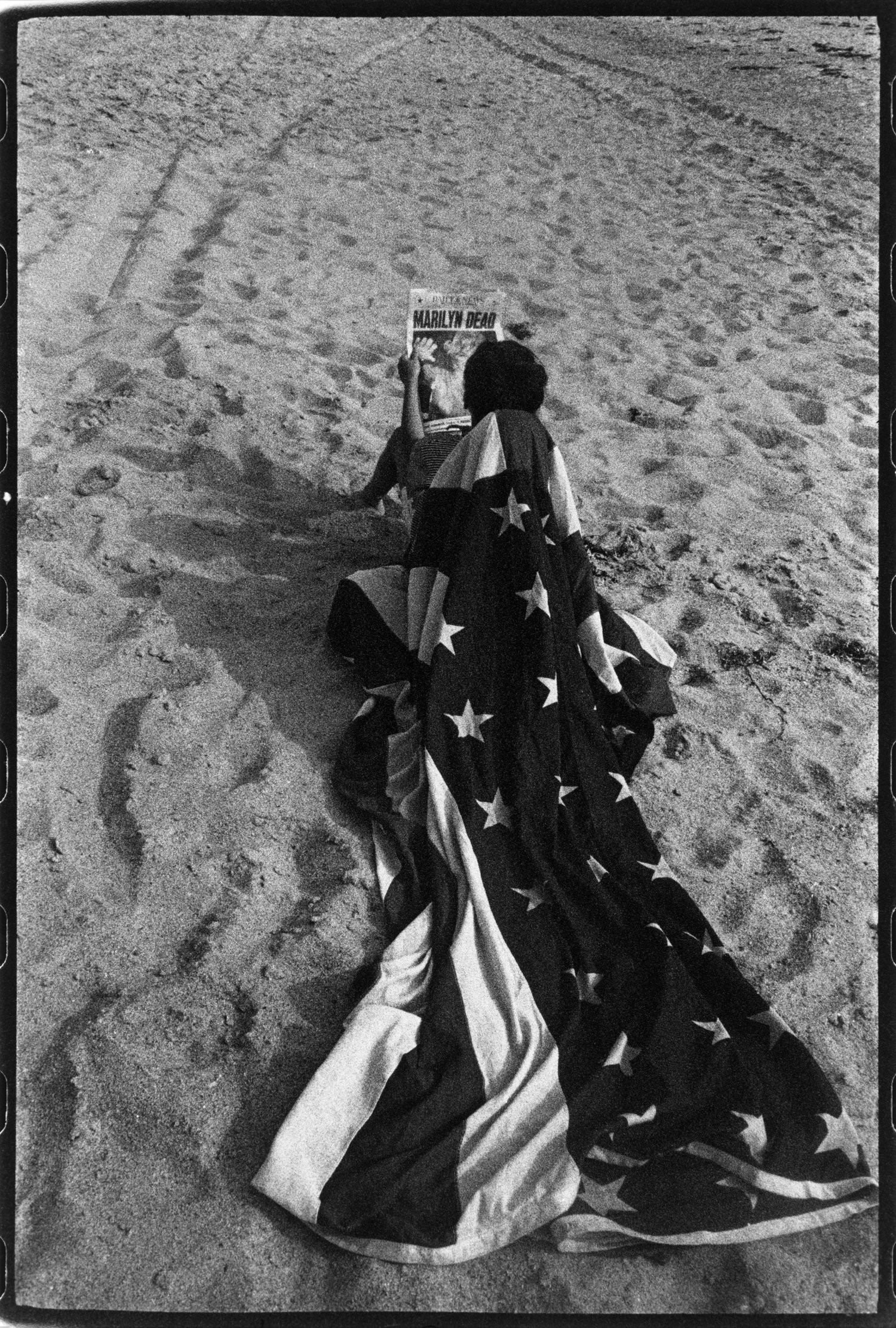  Robert Frank , Cape Cod, the day the Daily News came out,  1962 made 1960s. Courtesy of the Pilara Family Foundation Collection and Sotheby’s.&nbsp; 