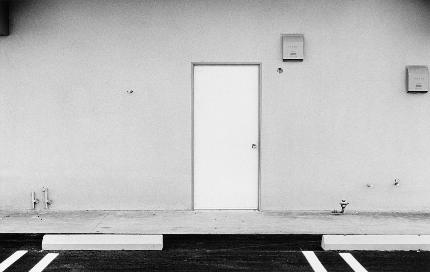  Lewis Baltz,  Mission Viejo (door) , 1968. Courtesy of the Pilara Family Foundation Collection and Sotheby’s. 