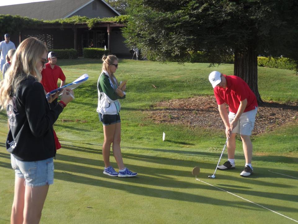 Jon Katelynn and Sarah at putting contest.jpg