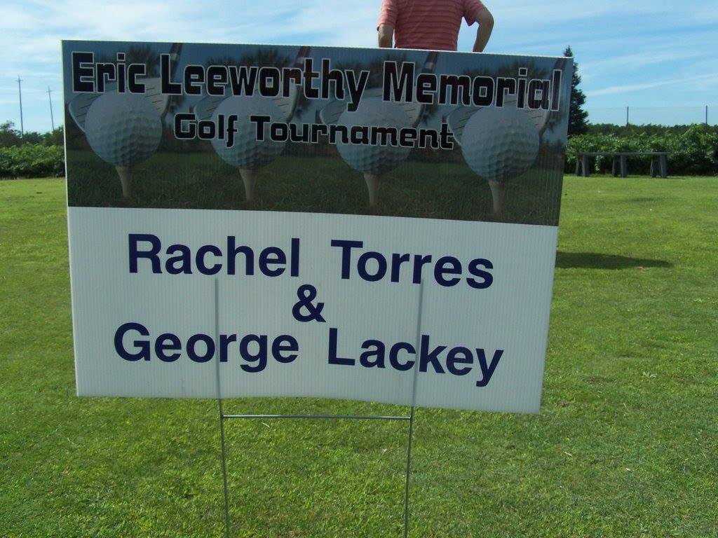 Rachel Torres and George Lackey Hole Sponsor.jpg