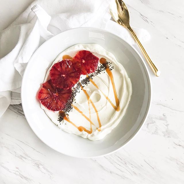 Greek yogourt is MY JAM. And so are blood oranges lately 🍊 
So when I came across this simple concoction from @livelytable I was like DAMN - must try. 🍊
・・・
The details: @siggisdairy plain skyr, blood oranges, @chosenfoods chia seeds and a drizzle 