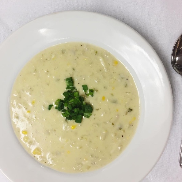 CRAB & CORN BISQUE Louisiana crab and fresh corn $20/4 servings