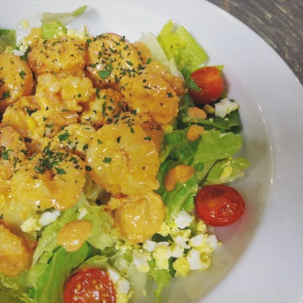 SHRIMP REMOULADE SALAD Grilled Gulf shrimp, romaine, cherry tomatoes, hard cooked egg $48/ 4-6 entrée servings or 8 appetizer servings