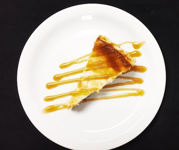 CREOLE CREAM CHEESECAKE Housemade Creole Cream Cheesecake with Caramel Sauce $48/whole cake, 12 slices