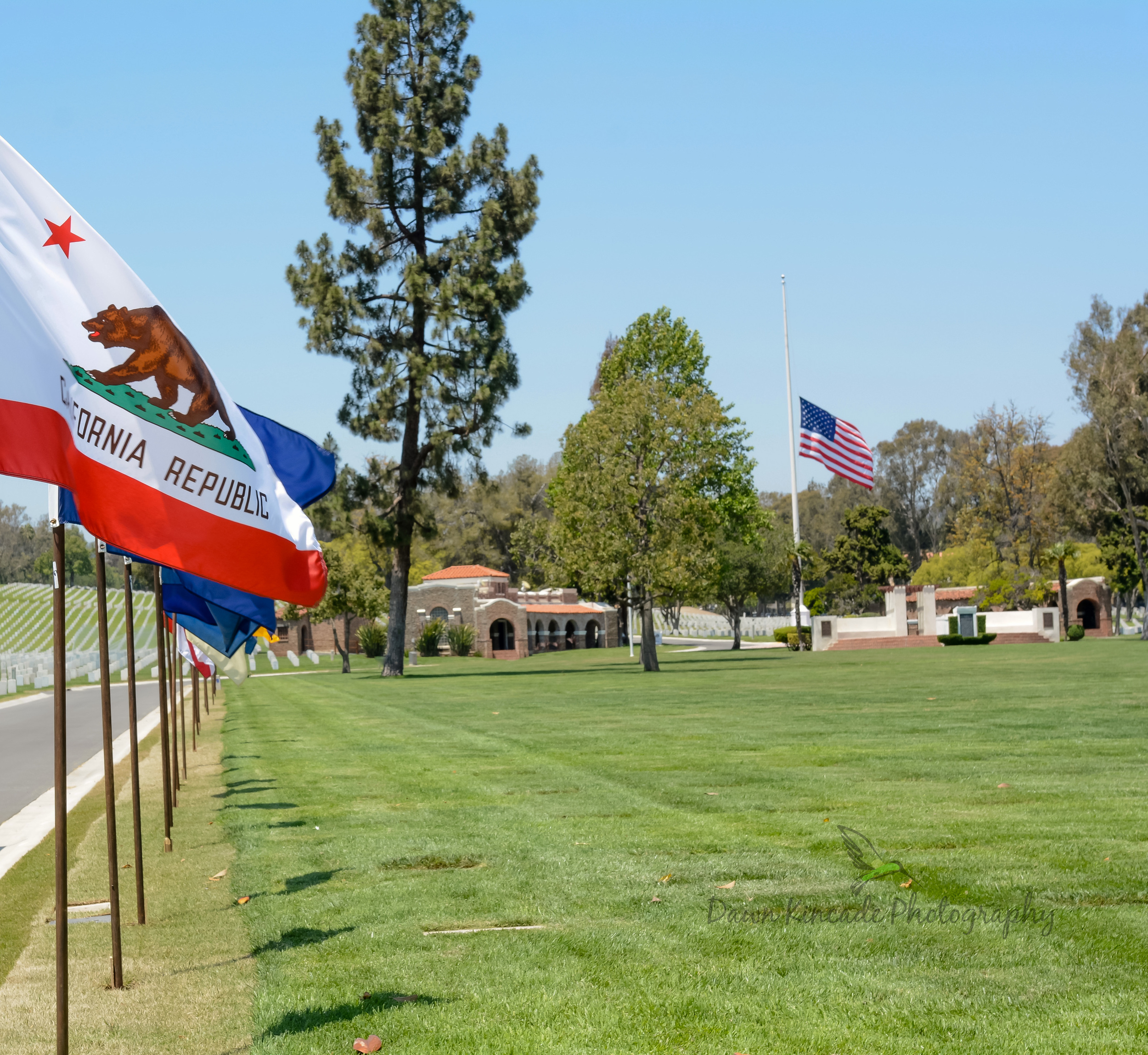 The American Flag flying at half staff at Los Angeles National Cemetery