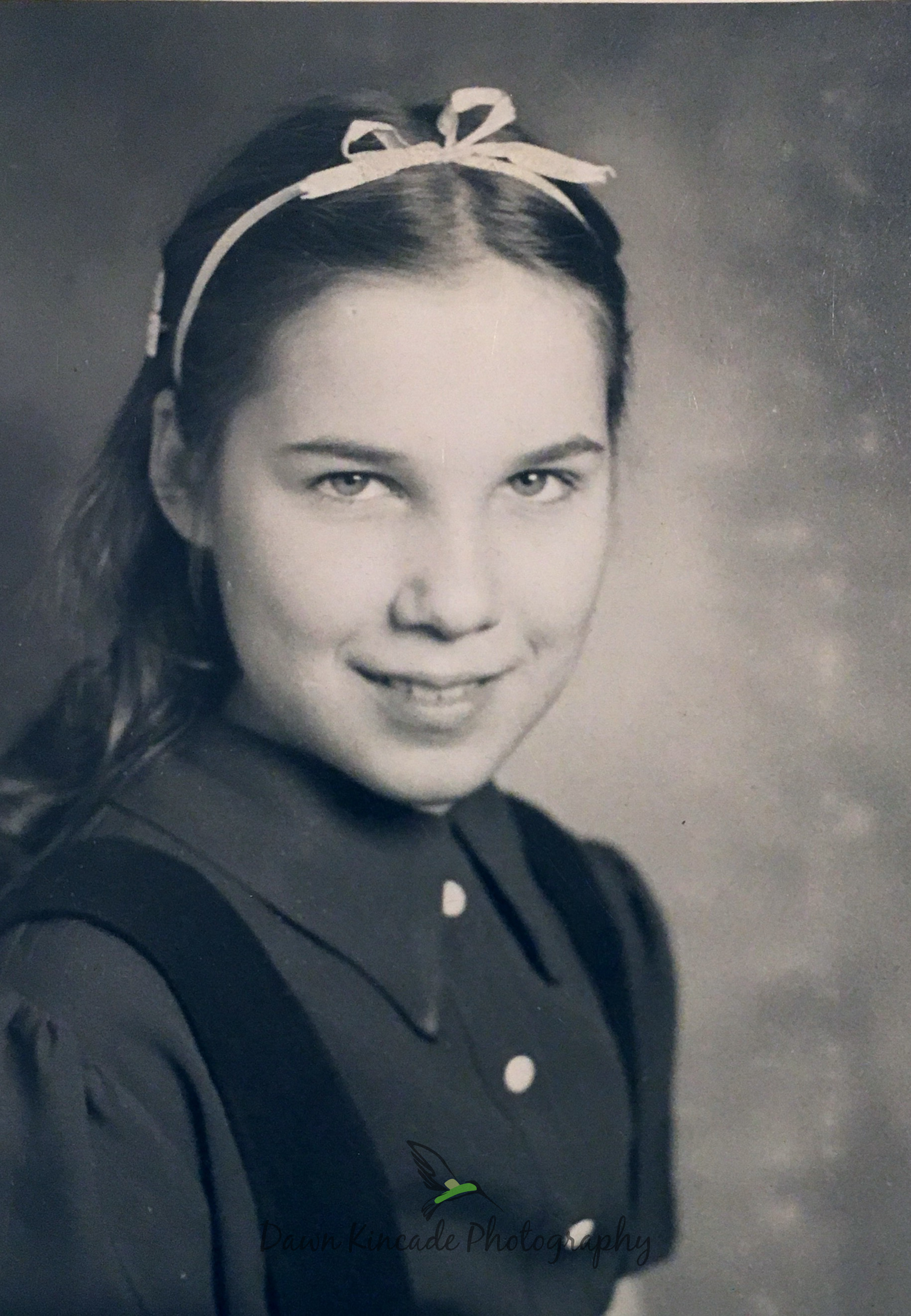 My Mom as a young girl. This is not a photo that I took. This is a scanned copy of an original that photo.