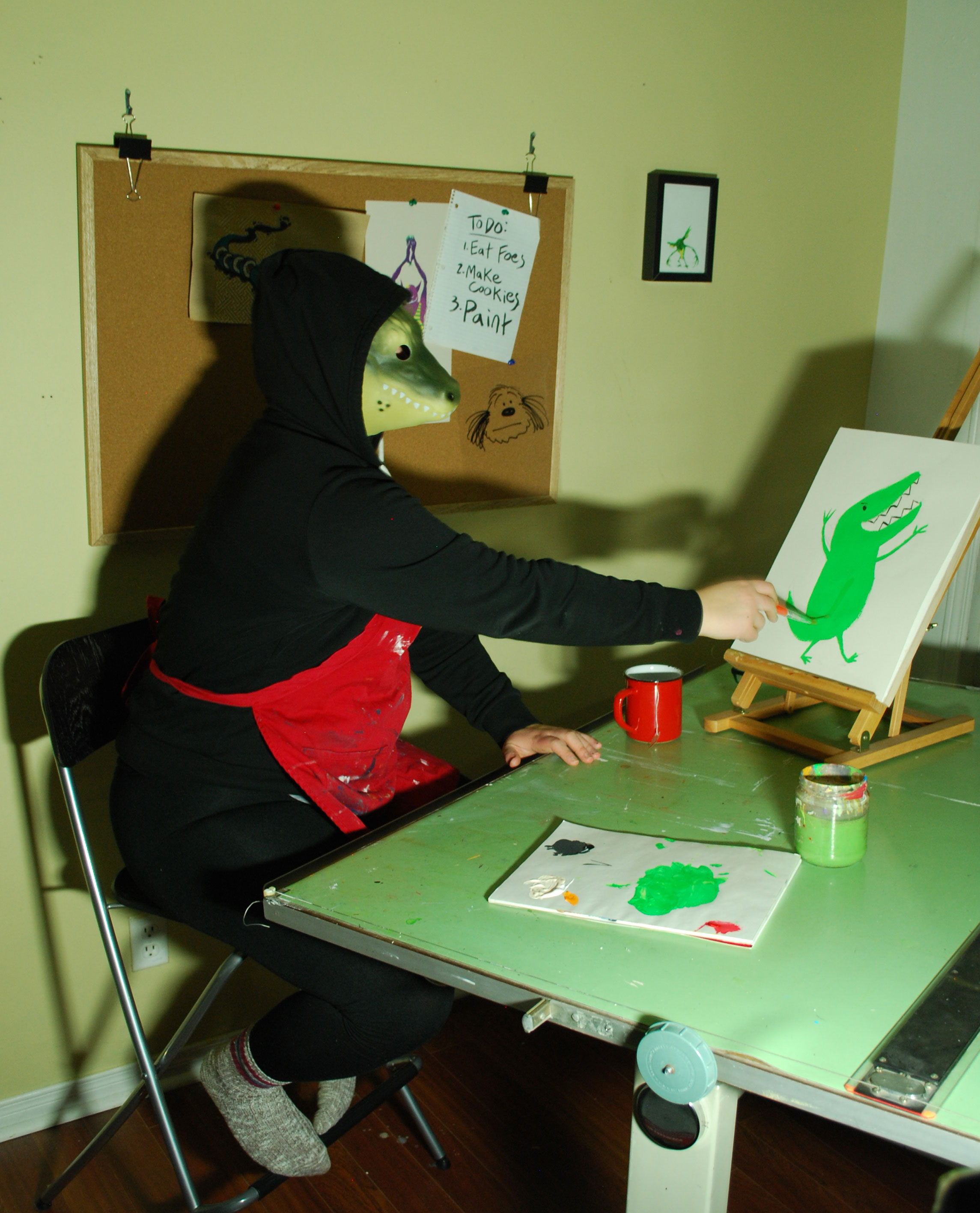 Portrait of the artist at work