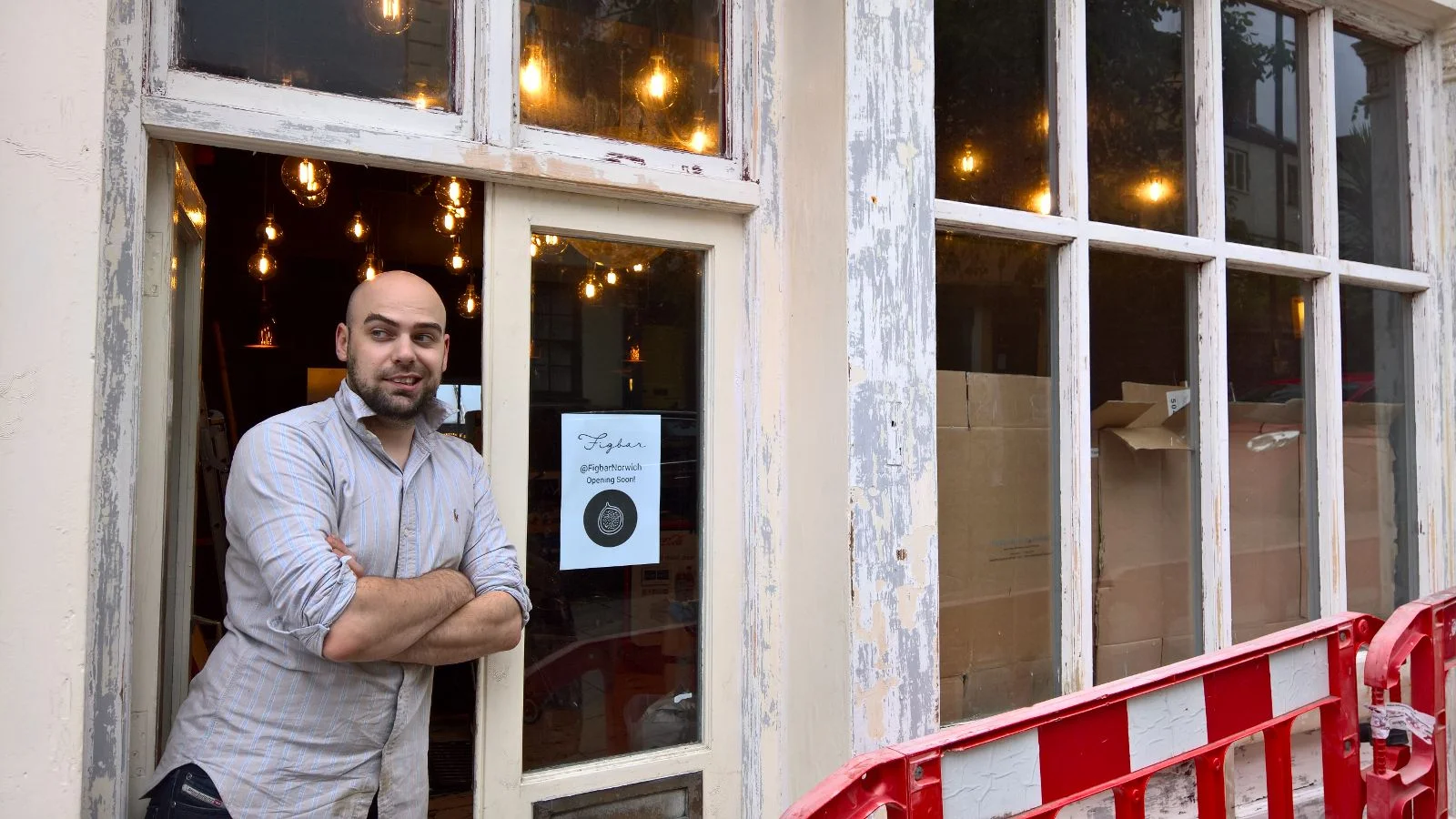 Shop front being prepped for new paint and a new sign with lovely model Chef Jaime Garbutt!