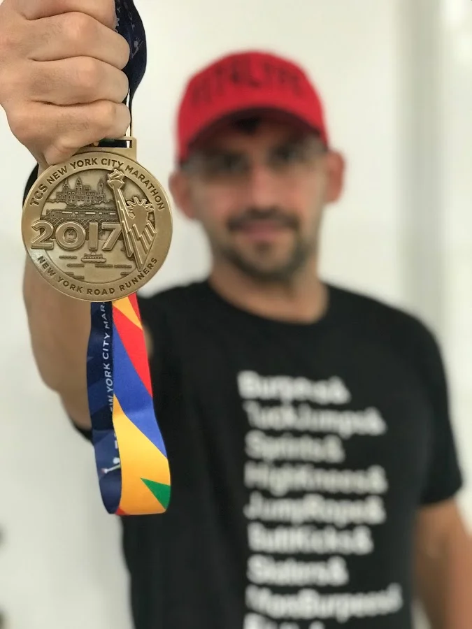 Jason with Medal.jpg