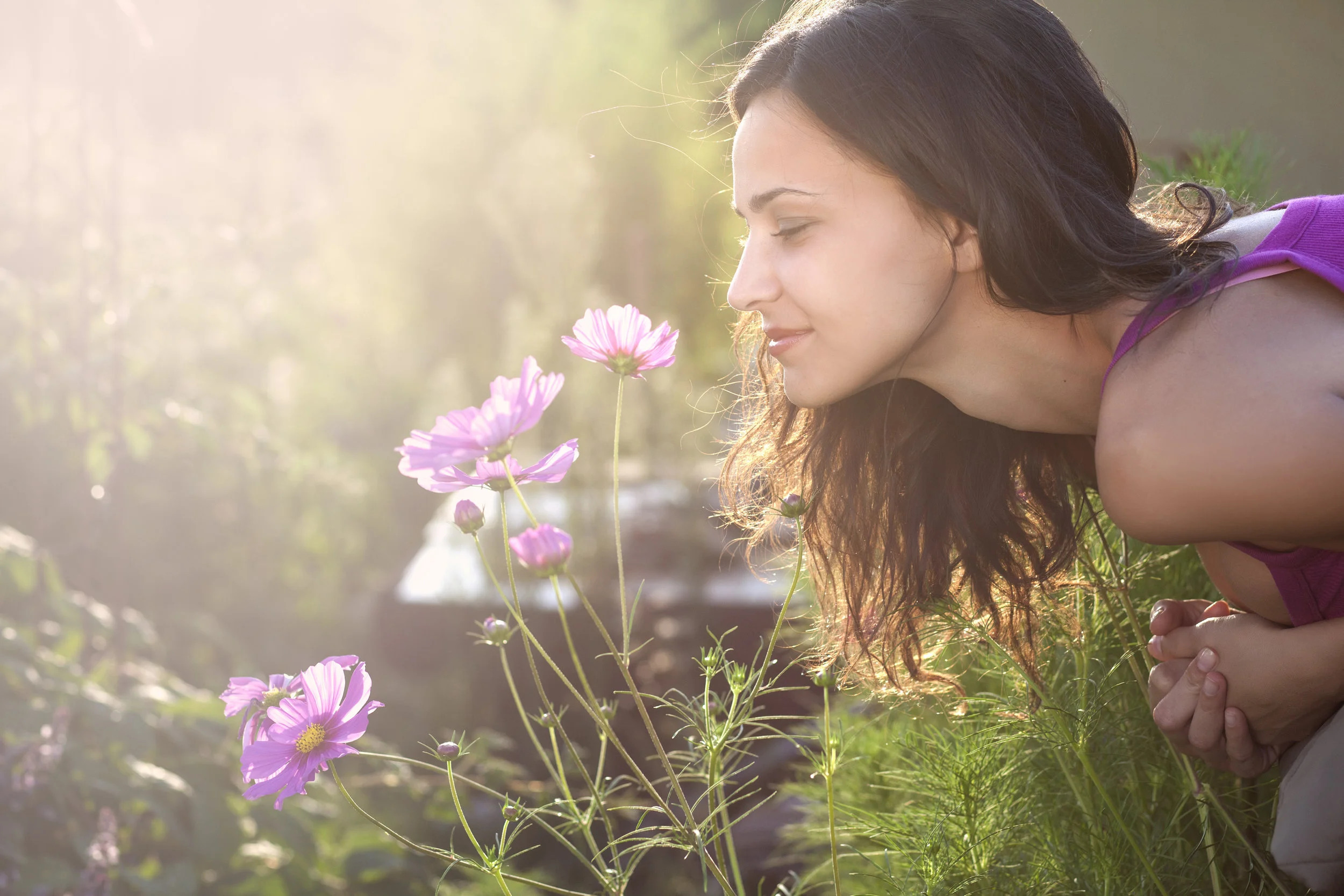 woman-smelling-flower.jpeg
