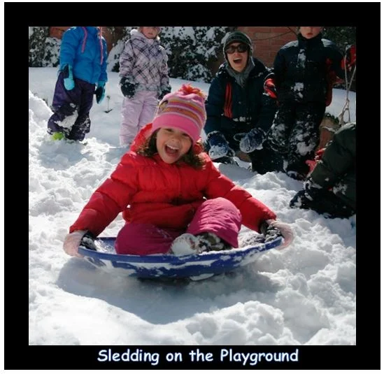 sledding on the playground.JPG