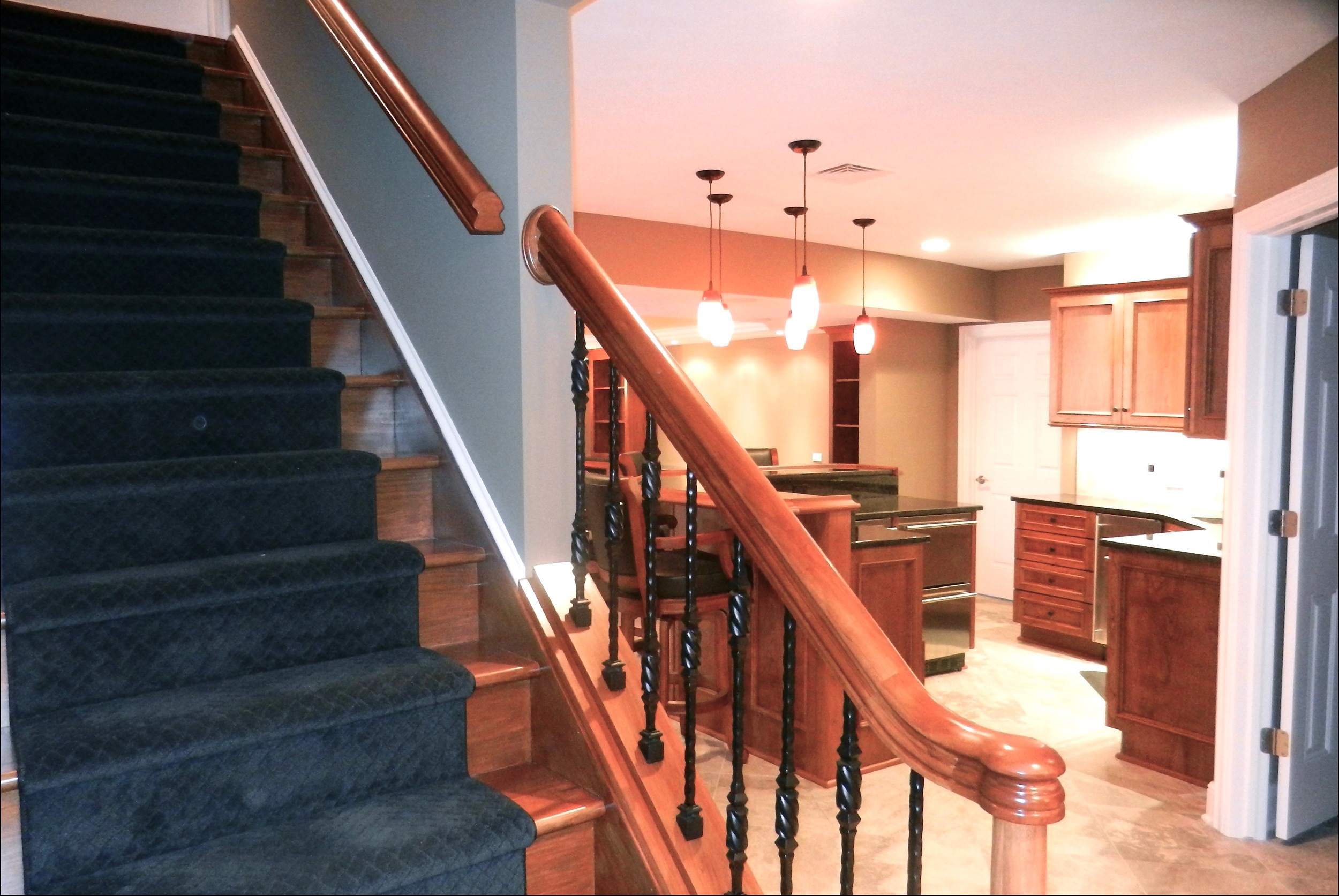 staircase-custom-kitchen-downstairs-wood-cabinets.jpg