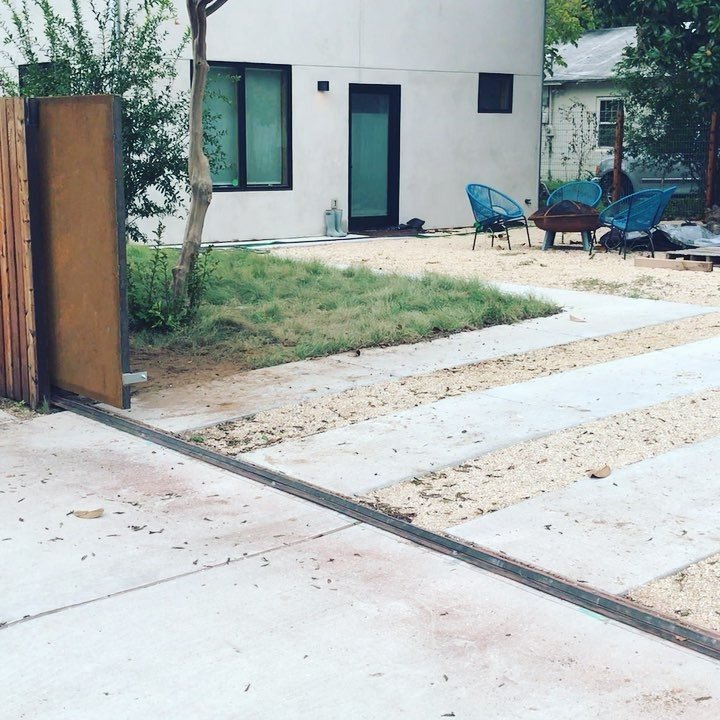 Custom Perforated Steel Gate Project utilizing a Solar @liftmaster RSL Gate Operator.  Using MyQ Tech the client can open their gate from anywhere in the world. Allowing the steel to rust adds weathered character and complexity to a modern day design