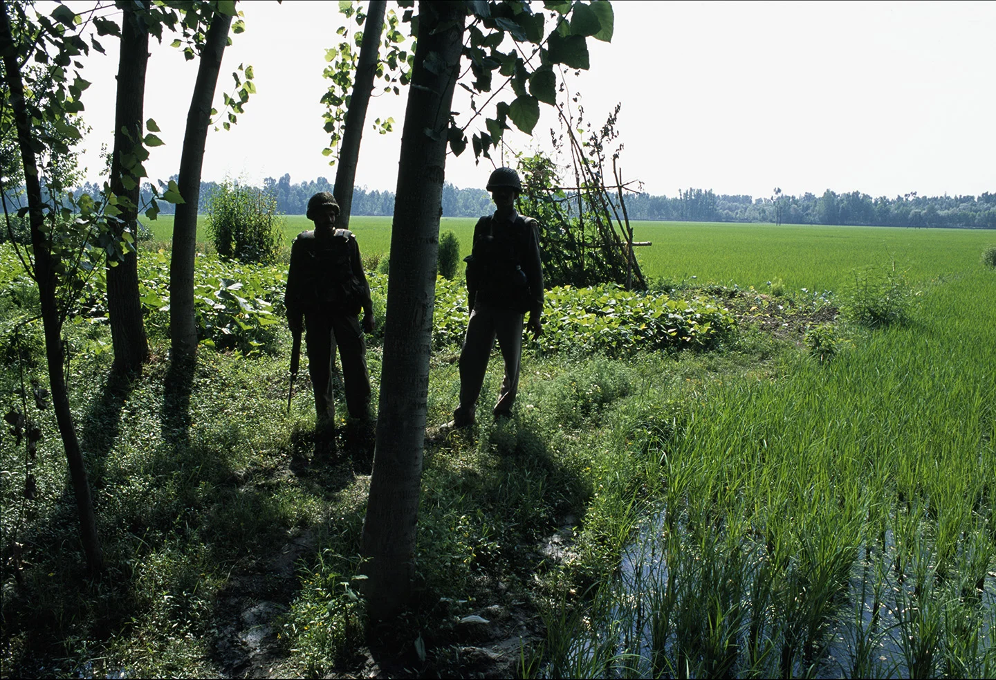 Indian soldiers checking for land mines, Kashmir.