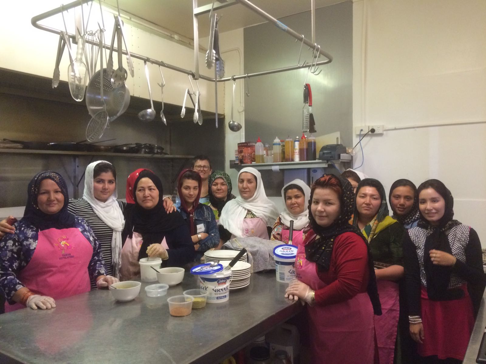 Afghan Hazara cooking group.jpg