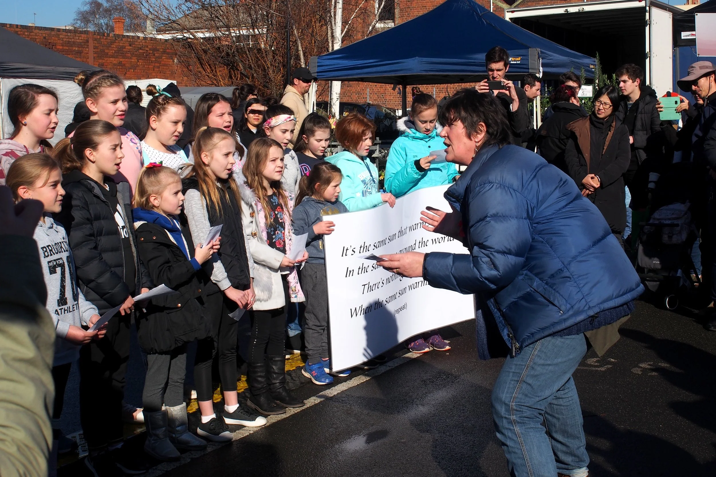 Community Pop-Up Choir sing "The Same Sun"