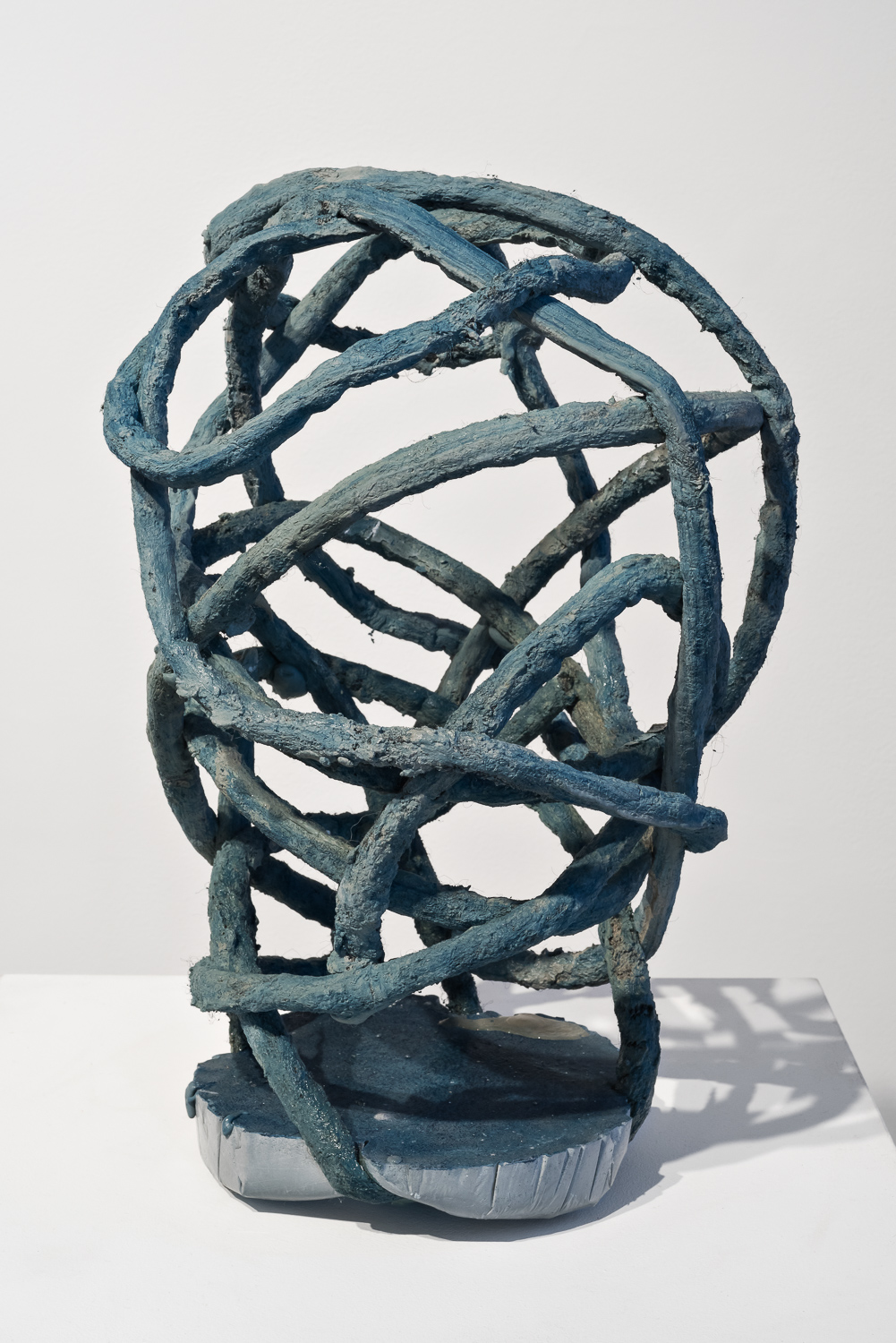  Title: Single Minded (Bust)  Date: 2018  Medium: Drystone, powder pigments, felted rope  Dimensions: 10" x 10" x 16.5"  Location: Valencia Studio  Price History: $150  Show History: Without Within- Growlery Show  Notes: 