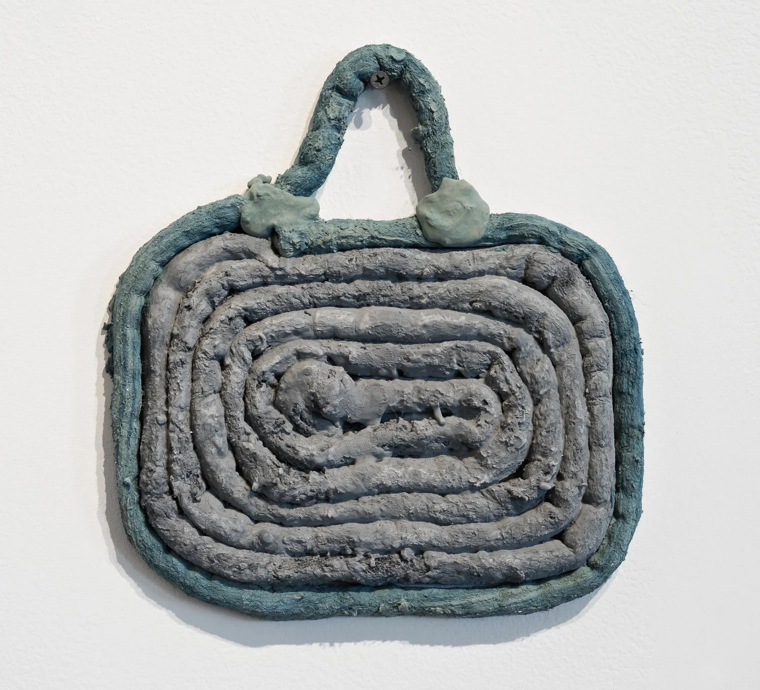 Title: Gyre Pendant  Date: 2018  Medium: Drystone, powder pigments, felted rope  Dimensions: 9"H x 10"W  Location: Valencia Studio  Price History: $75  Show History: Without Within- Growlery Show  Notes: 