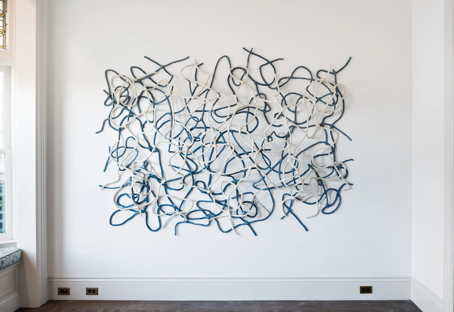  Title: Cavernous Current  Date: 2018  Medium: Drystone, powder pigments, felted rope  Dimensions: 6'H x 8'W  Location: Valencia Studio  Price History: $2000  Show History: Without Within- Growlery Show  Notes: 