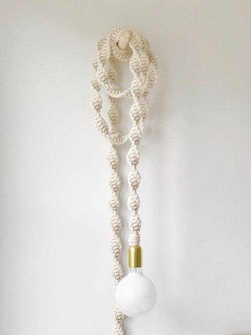 Artist: Windy Chien Title: Helix Light Date made: 2017 Location Purchased: From studio when I rented space from her Price: ? Year acquired: 2017 Dimensions: 15’ long Media: natural white cotton rope
