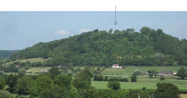 View from the south with the existing house indicated with an arrow