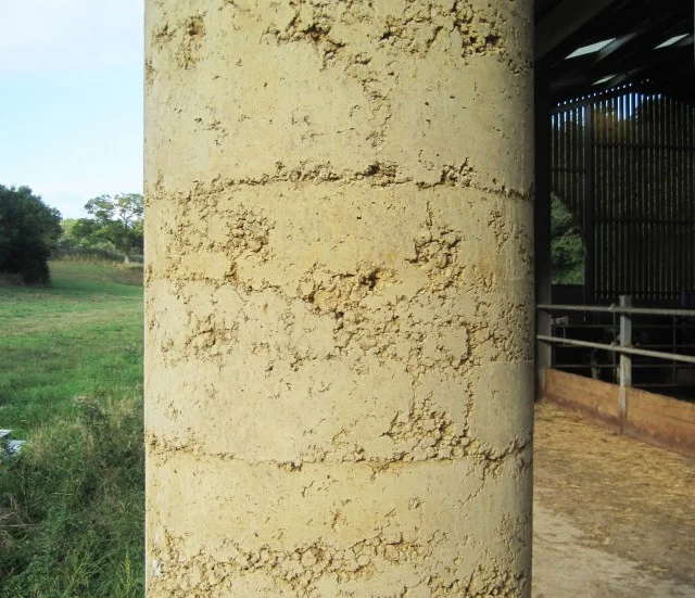 Here are the columns being cast with the formwork in place at the top of each one.