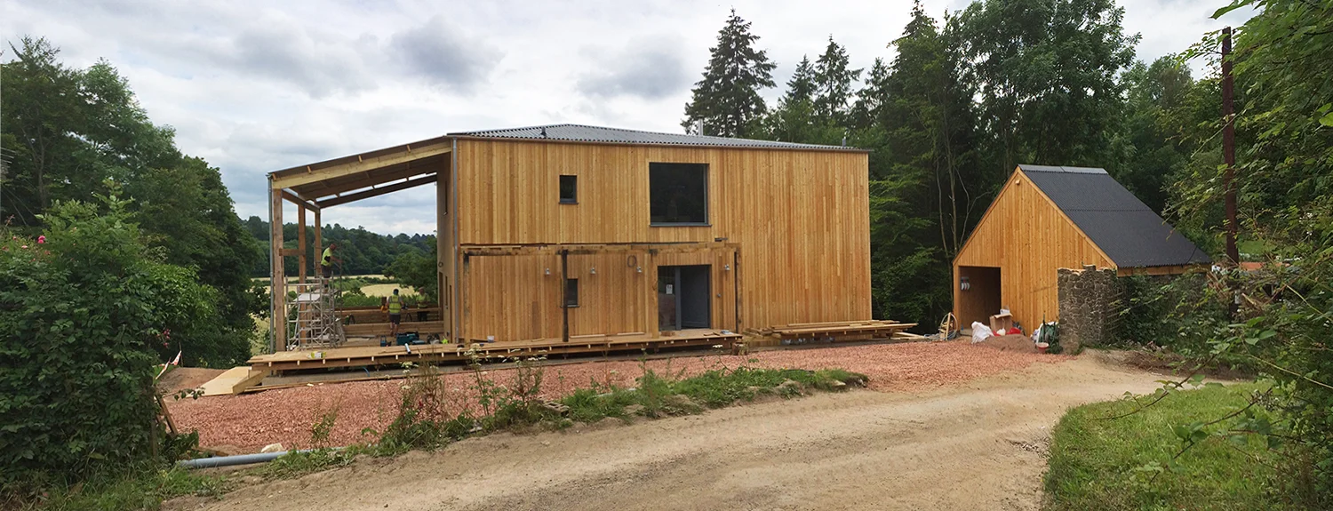 Devon-House-Passivhaus-Prewett-Bizley-Architects-loggia-porch-larch.jpg