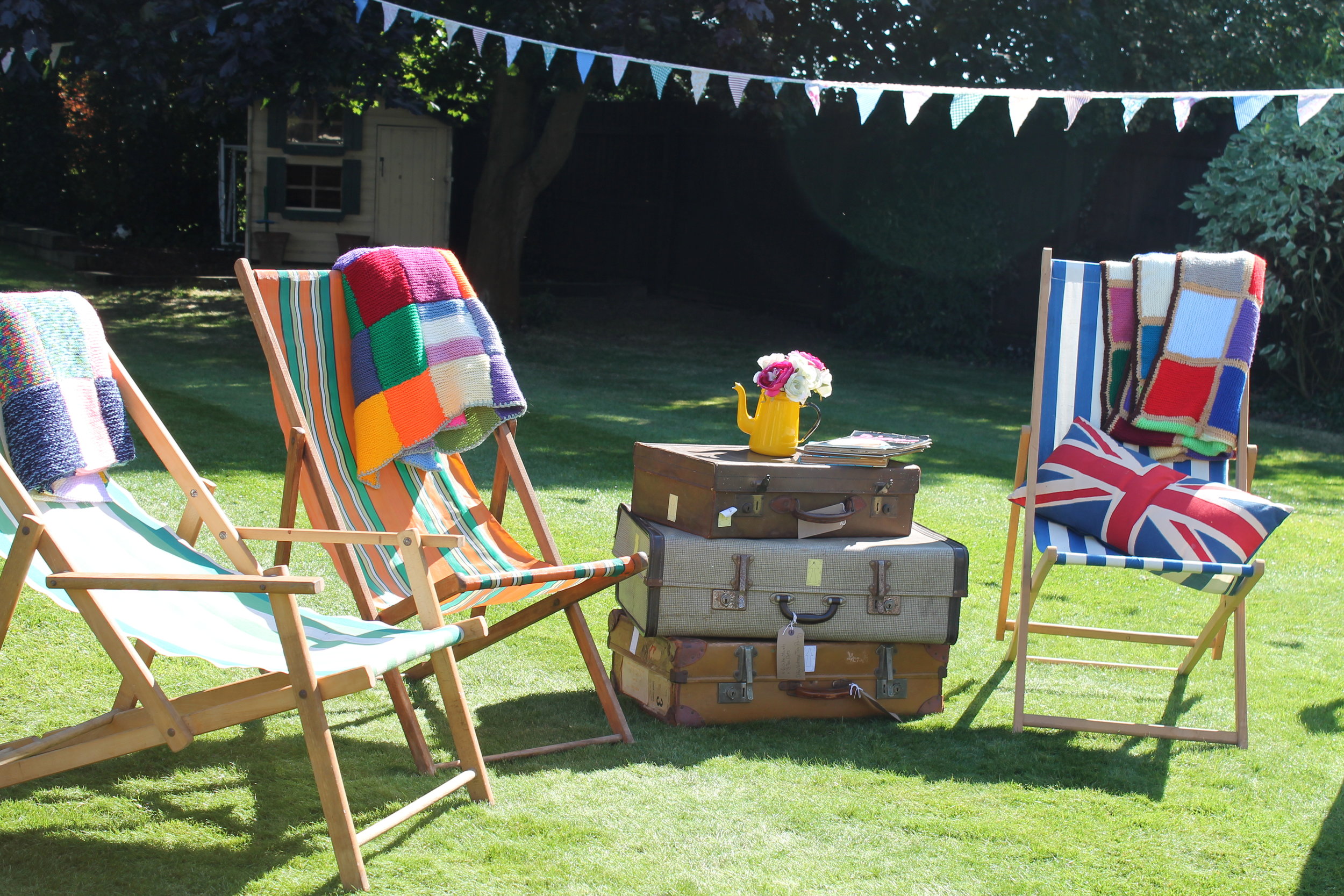 Deckchairs and cases to put your drinks.JPG