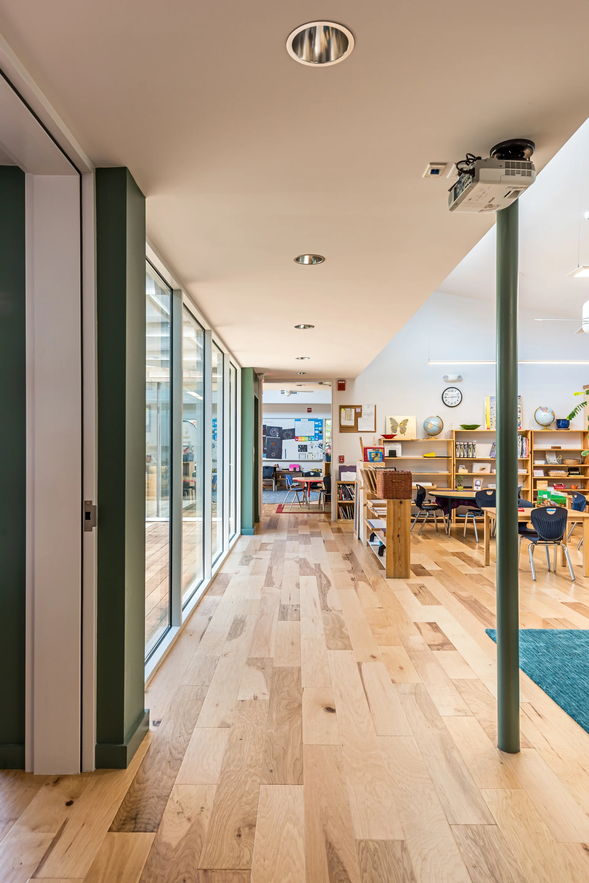 The classrooms are all directly connected with oversized doors to give the teachers the option of expanding the spaces into each other. When it is time to focus, teachers can close the doors, and isolate each space.