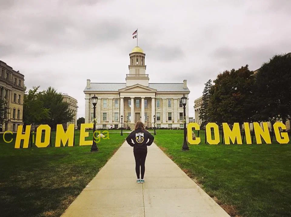 Rachel Johnson, Spirit Director for UI Homecoming Executive Council, who along with her Dad, created, painted, and installed these fabulous letter on campus during Homecoming Week! They brought a smile to Hawkeye students and alumni, and thousands of photos were taken next to them :)