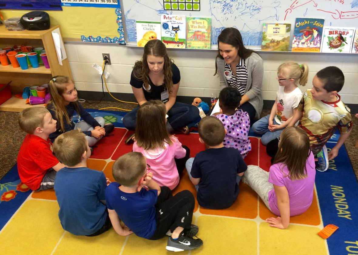 Amy O'Grady teaches Kindergarteners about germs, through the Young Pediatric Nurse Clinicians Program. 