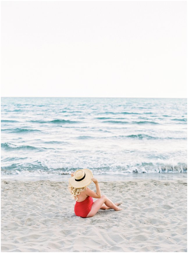 Beach pregnancy session Barcelona red swimsuit