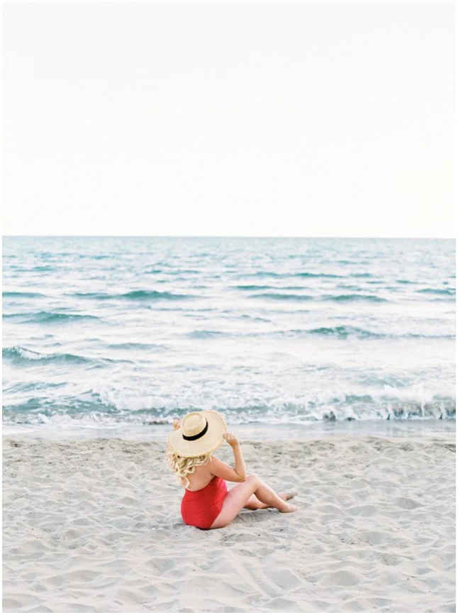 Beach pregnancy session Barcelona red swimsuit