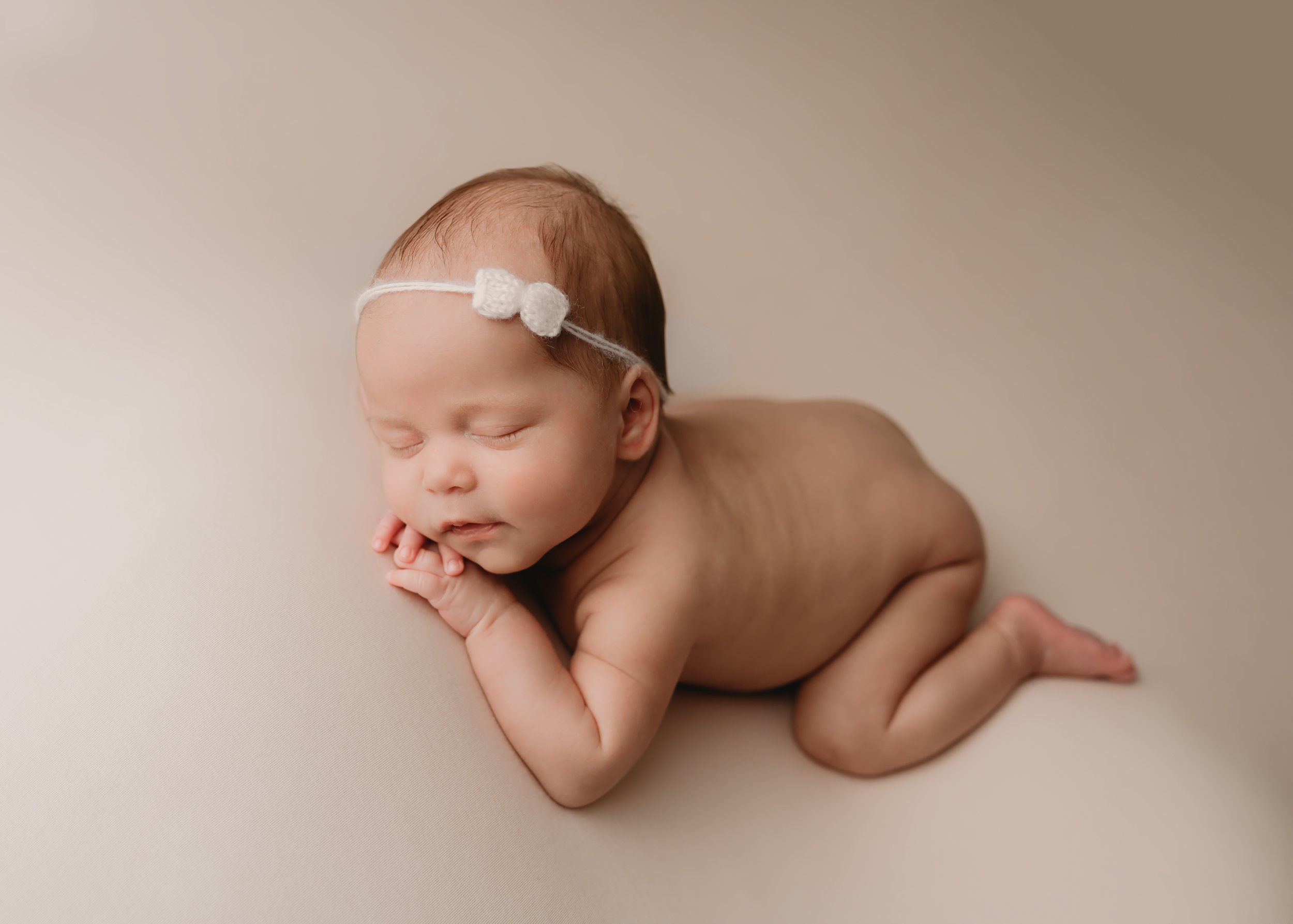 South-florida-Newborn-Photographer-Baby-chin-on-hands