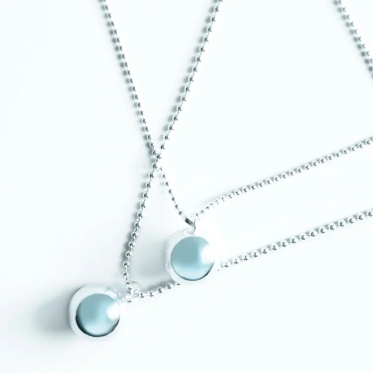 Silver-Angel-Caller-Chime-Ball-Necklaces.jpg