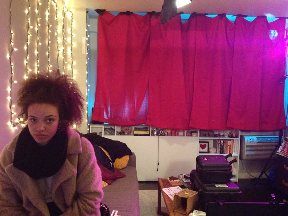 Isabella Jackson as lighting is set-up for a day-for-night party scene