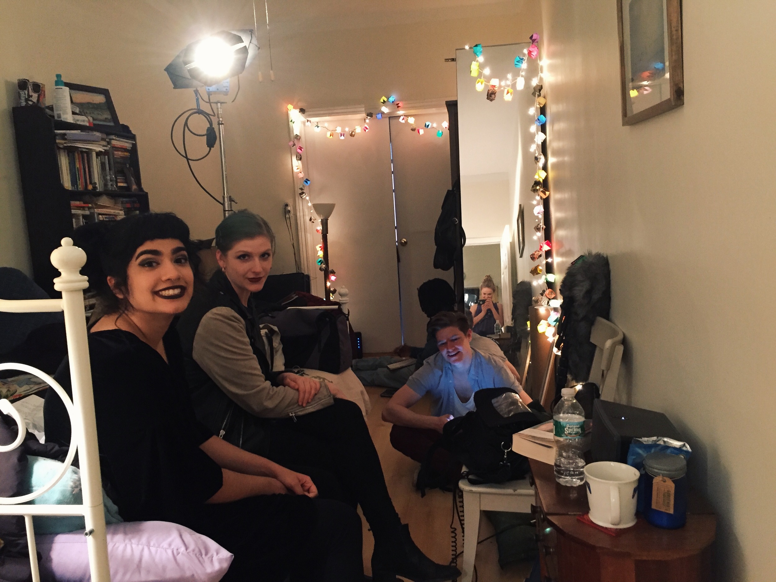 Nicole Wood photographs Cristina Vazquez de Mercado, Nora Kennedy, and Matthew Brown as they wait for their scene