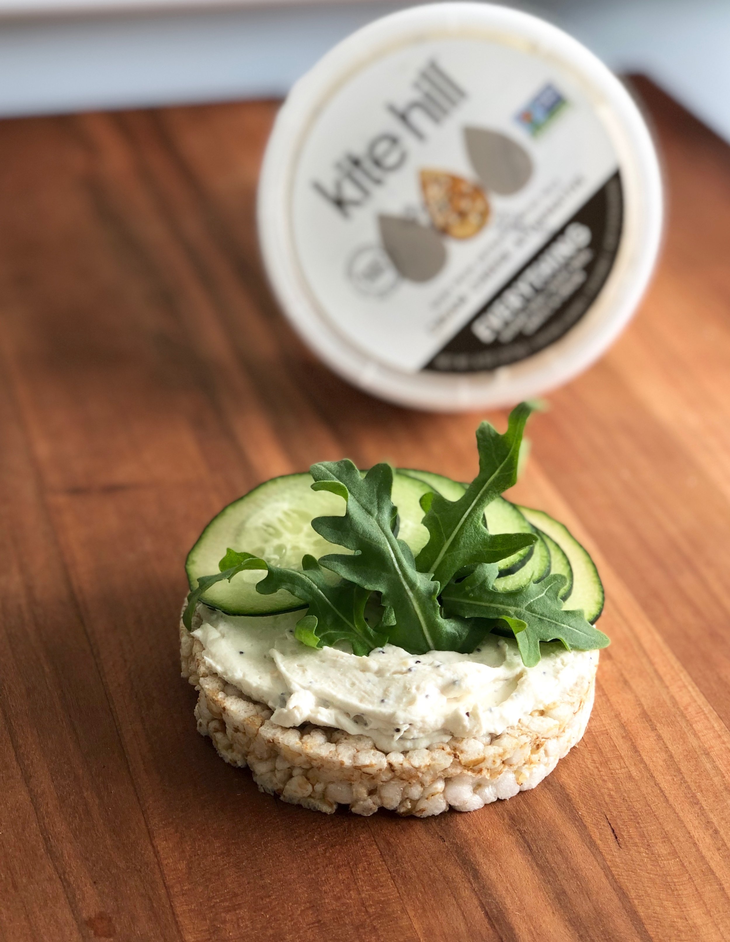 This Kite Hill Everything Almond Milk Cream Cheese is my new obsession… it’s full of flavor with poppy seeds, garlic, sesame seeds, onion and almond milk. It’s dairy-free, soy-free, non-gmo, gluten-free and there’s no artificial preservatives. I want to schmear it on anything and everything! I picked up a farmers market cucumber at the shop and some fresh arugula. Before diving in I sprinkled some sprouted seeds on top for a boost of flavor, delish!