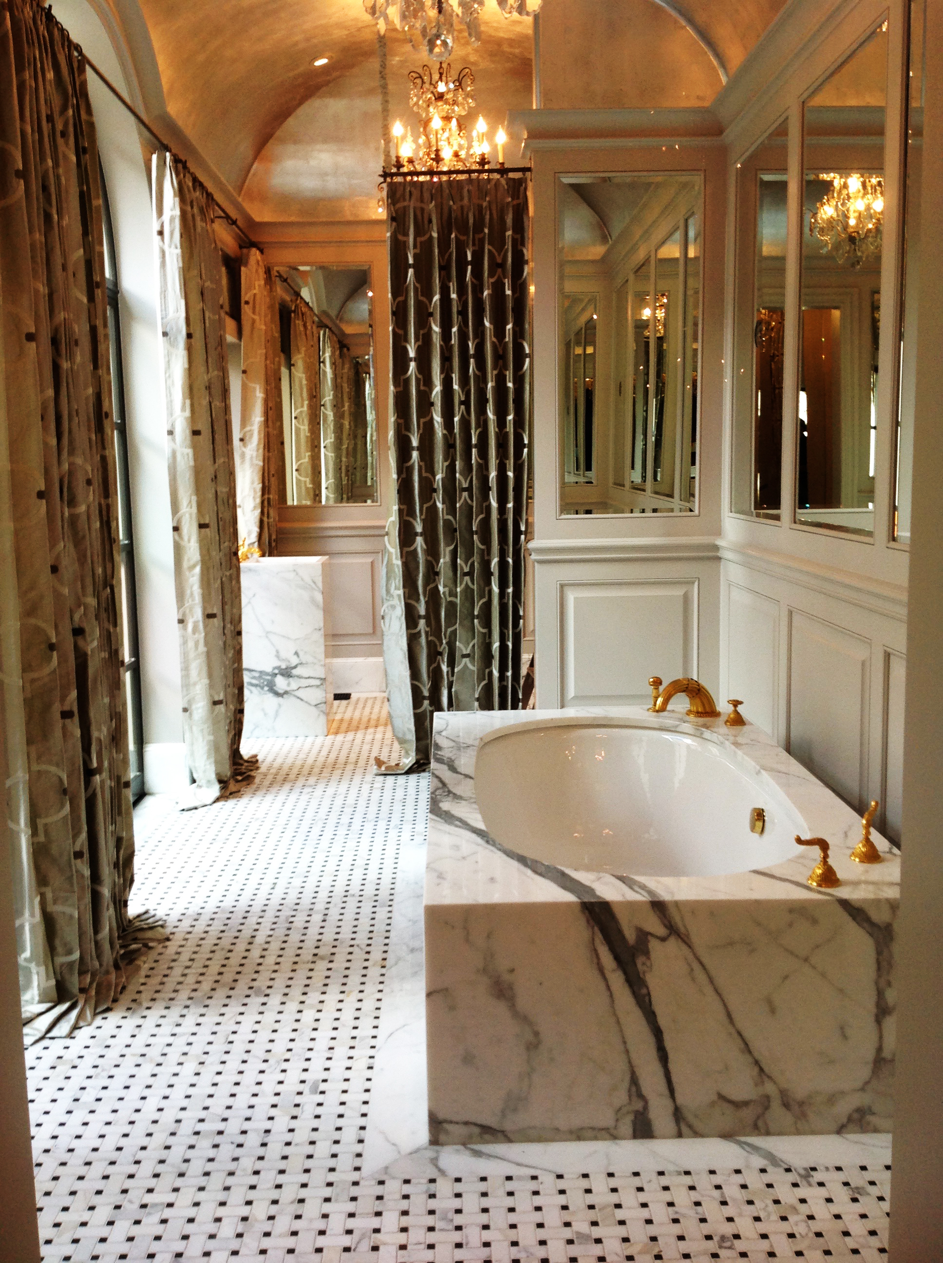  Silver leaf ceiling enhanced this elegant master bathroom in a Highland Park Dallas estate.&nbsp; 