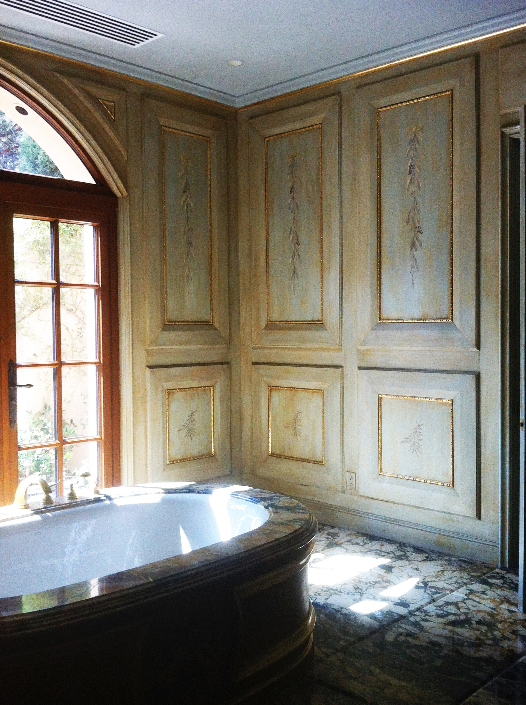  Chateau inspired faux finishing in a coffered master bathroom. 