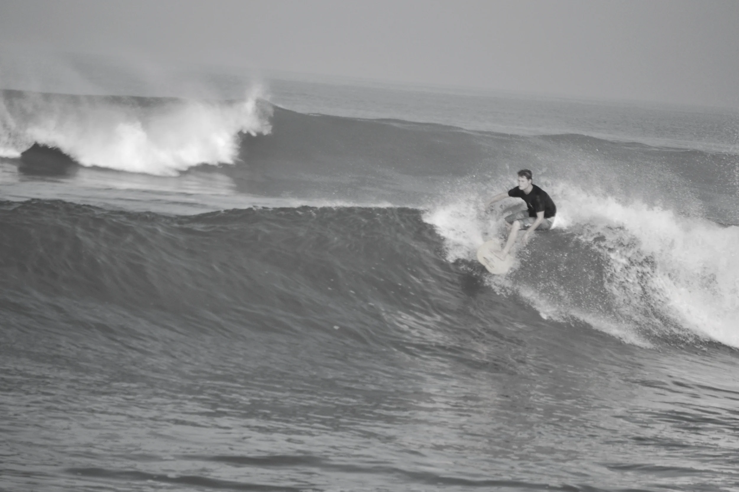 Steve surfing Echo Beach, Canggu, Bali, Indonesia. 