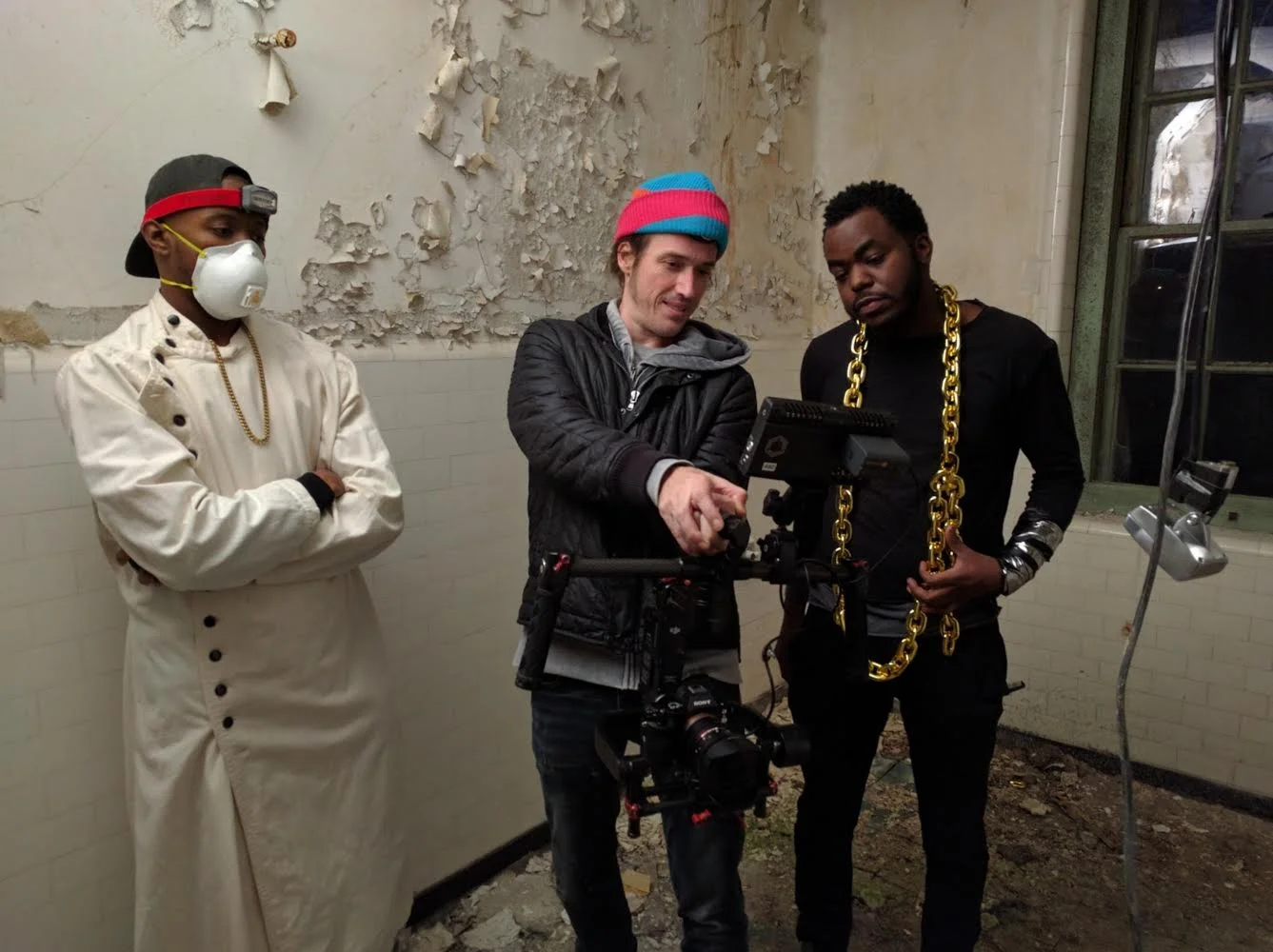 reviewing a few of the Sacrifice shots on set. left to right: Thank Aaron, director chris morgan, and Marco Pavé