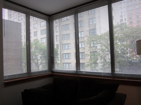 Inside my apartment at the Envoy Club. Beautiful view, lots of windows,large room, and fairly cheap.