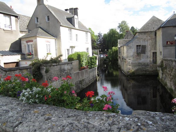 A view from one of the bridges over the Aure River, which flows through the old city center of Bayeux. Planters of flowers were everywhere.