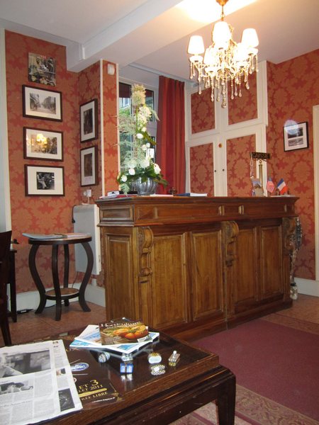 The front desk at the Hotel Churchill Bayeux. The hotel has since become part of a larger hotel system with the addition of the new Villa Lara Hotel.